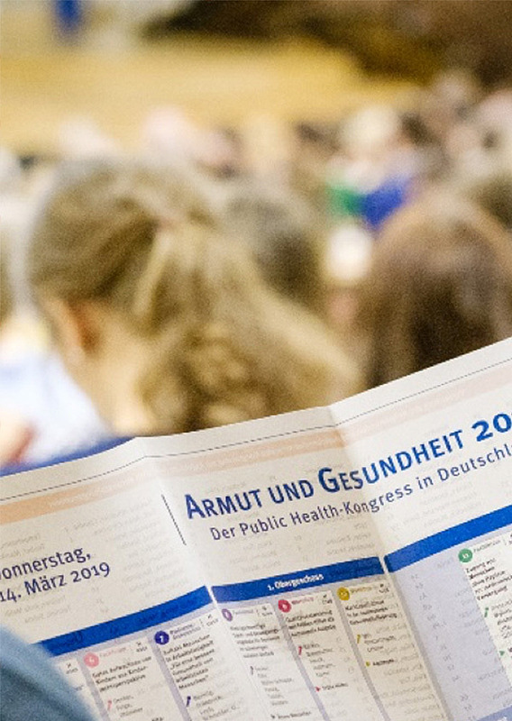 Ausschnitt zeigt aufgefalteten Programmplan vom Kongress