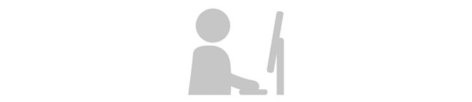 Icon mit einer Figur vor einem Monitor an Tastatur arbeitend